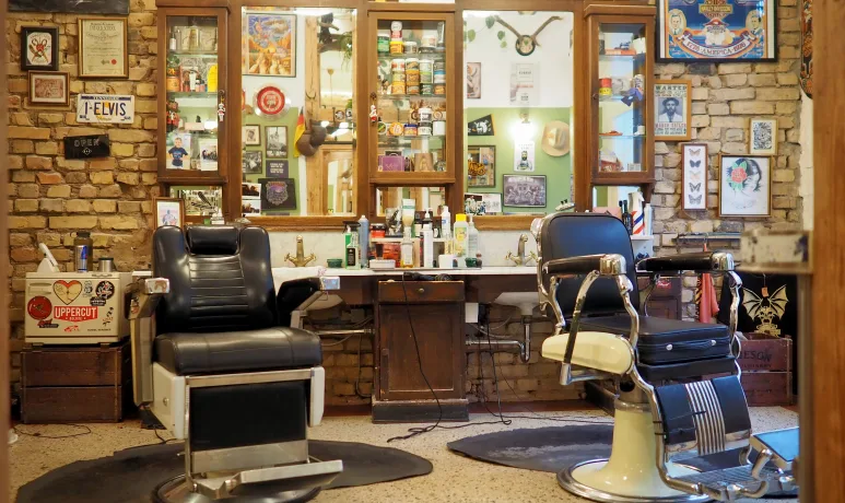 Sailer's Barbershop interior with vintage barber chairs and classic decor